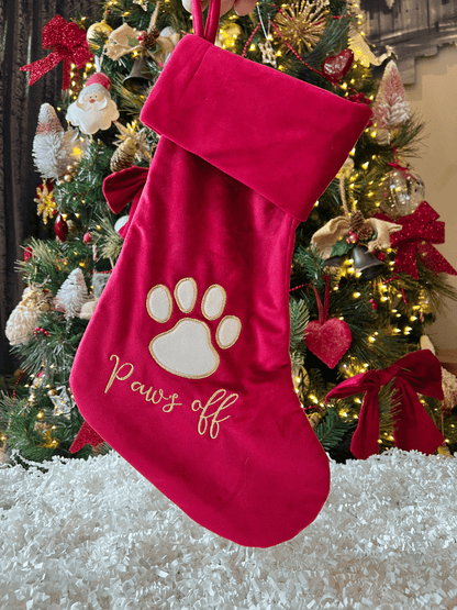 dog paws off christmas stocking